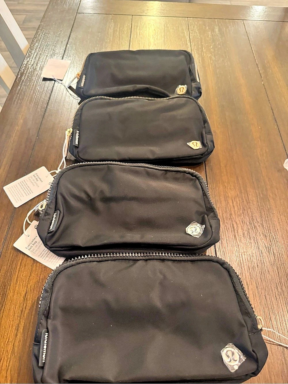 Brand new Lululemon Black Cosmetic Pouch Set NWT. $30 each bag.